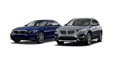 Navy blue and dark grey BMW image icons. | Competition BMW of Smithtown in St. James NY