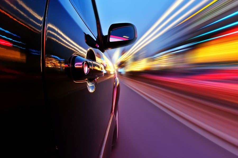 Vehicle in motion on city road