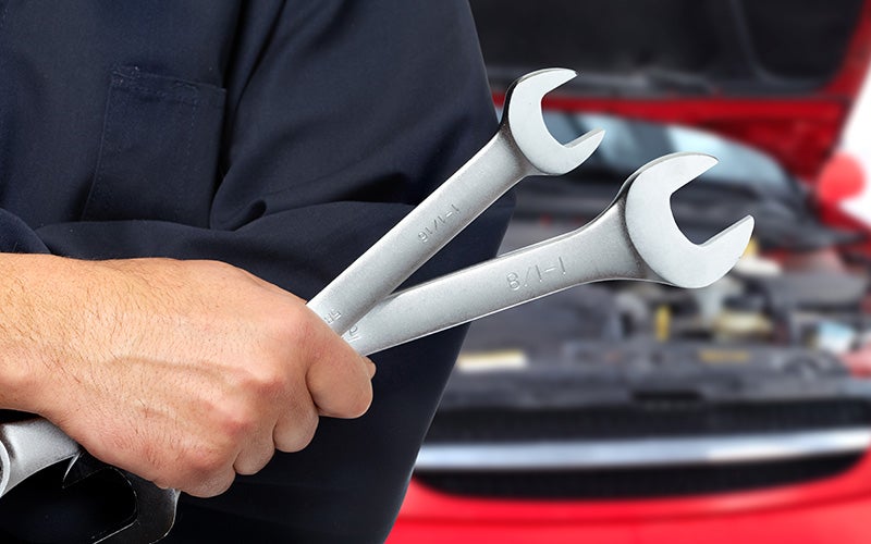 close-up automotive repair or maintenance scene